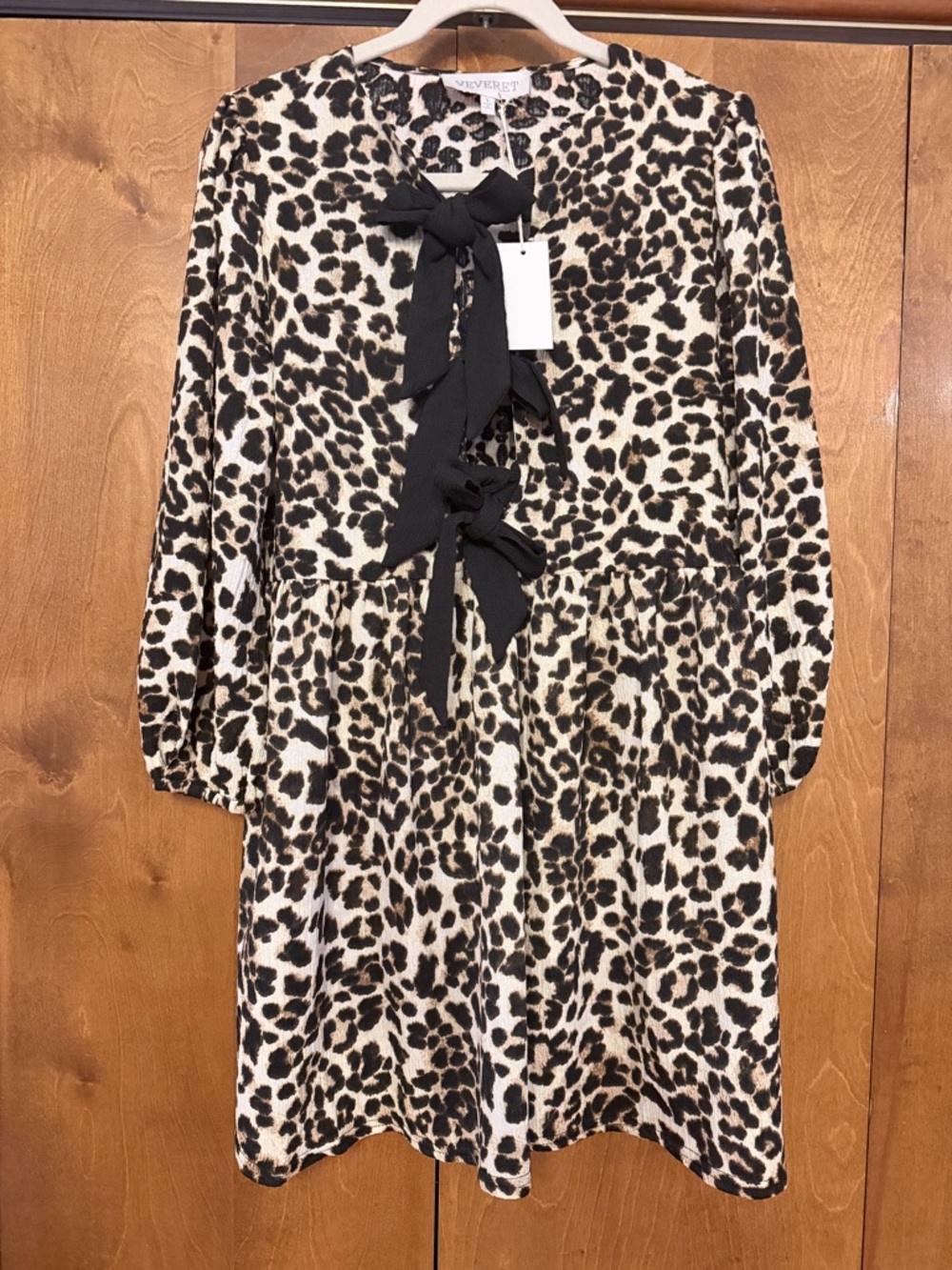 Leopard-print dress with black bows